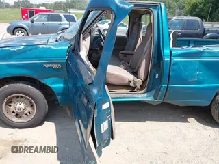 1994 Ford Ranger Splash z VIN 1FTCR10A2RUD04809, wystawiony jako IAAI lot #42685685 z przebiegiem 215 658 mil mil oraz . Historia ofert i sprzedaży dostępna na DreamBid. Obrazek 6.