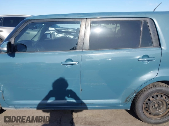 2009 Scion xB with VIN JTLKE50EX91094466, listed as a IAAI auction lot 42068298 with 236,237 mi miles. Bid and sale history available at carsss.com. Image 13.