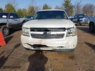 2011 Chevrolet Suburban LTZ with VIN 1GNSCKE02BR317269, listed as a IAAI auction lot 41446893 with 304,318 mi miles. Bid and sale history available at carsss.com. Image 12.