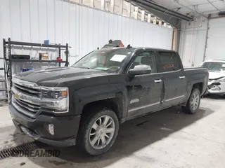 2016 Chevrolet Silverado 1500 High Country with VIN 3GCUKTEC8GG221707, listed as a IAAI auction lot 41587628 with 63,740 mi miles and . Bid and sale history available at DreamBid. Image 2.