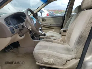2001 Nissan Altima GXE with VIN 1N4DL01D81C242292, listed as a Copart auction lot 72706494 with 0 mi miles and Salvage Title. Bid and sale history available at carsss.com. Image 7.