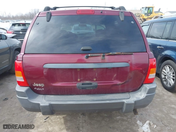 2001 Jeep Grand Cherokee Laredo with VIN 1J4GW48S51C739725, listed as a IAAI auction lot 41800431 with 220,396 mi miles. Bid and sale history available at carsss.com. Image 16.