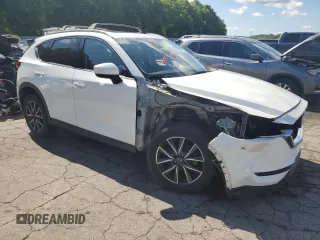 2018 Mazda CX-5 Grand Touring с VIN JM3KFADM3J1351532, выставлен на аукционе Copart как лот 55567405 с пробегом 99 134 миль миль и Списание • Salvage title. История ставок и продаж доступна на DreamBid. Изображение 4.