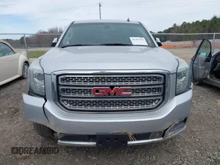 2015 GMC Yukon SLE with VIN 1GKS1AKC8FR201818, listed as a IAAI auction lot 41707754 with 193,100 mi miles. Bid and sale history available at carsss.com. Image 12.