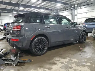 2021 MINI Clubman Cooper S with VIN WMWXJ1C05M2P49901, listed as a Copart auction lot 83023554 with 49,357 mi miles and Salvage Title. Bid and sale history available at carsss.com. Image 3.
