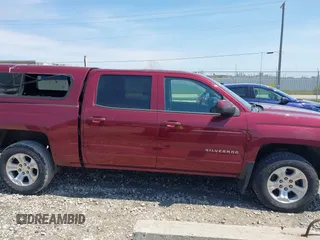 2015 Chevrolet Silverado 1500 LT with VIN 3GCUKREC0FG428366, listed as a IAAI auction lot 42210969 with 118,352 mi miles and . Bid and sale history available at DreamBid. Image 13.