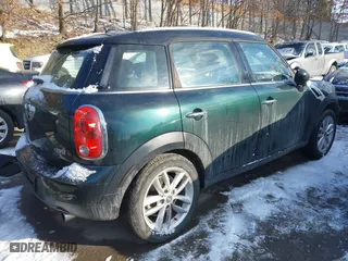 2013 MINI Cooper Countryman with VIN WMWZB3C53DWM08700, listed as a IAAI auction lot 41402093 with 71,109 mi miles. Bid and sale history available at carsss.com. Image 4.