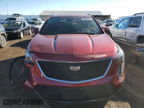 2022 Cadillac XT4 AWD Sport с VIN 1GYFZFR49NF130155, выставлен на аукционе Copart как лот 80286034 с пробегом 28 447 миль миль и Списание • Salvage title. История ставок и продаж доступна на DreamBid. Изображение 5.
