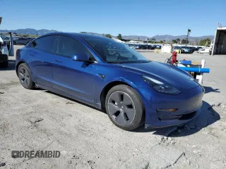 2021 Tesla Model 3 Long Range with VIN 5YJ3E1EBXMF925147, listed as a Copart auction lot 49741275 with 106,947 mi miles and Salvage Title. Bid and sale history available at DreamBid. Image 4.