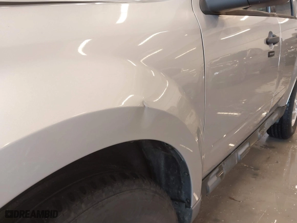 2010 Ford Escape XLT with VIN 1FMCU0D70AKB09942, listed as a IAAI auction lot 41572582 with 218,296 mi miles. Bid and sale history available at carsss.com. Image 22.