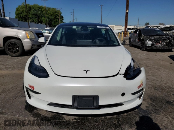 2023 Tesla Model 3 with VIN 5YJ3E1EA7PF450343, listed as a Copart auction lot 52446595 with 36,137 mi miles and Salvage Title. Bid and sale history available at DreamBid. Image 5.