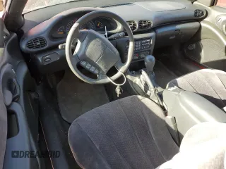 1998 Pontiac Sunfire z VIN 4G2JB32T7WB202549, wystawiony jako Copart lot #75095294 z przebiegiem 38 312 mil mil oraz Szkoda całkowita • Salvage title. Historia ofert i sprzedaży dostępna na DreamBid. Obrazek 8.