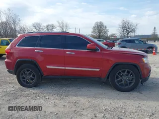2011 Jeep Grand Cherokee Laredo with VIN 1J4RR4GG6BC527897, listed as a IAAI auction lot 42032975 with 148,875 mi miles. Bid and sale history available at carsss.com. Image 14.