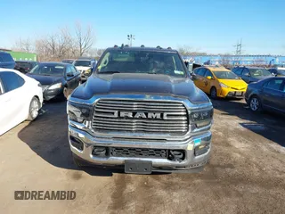 2021 Ram 2500 Laramie z VIN 3C6UR5FL7MG629012, wystawiony jako IAAI lot #41369353 z przebiegiem 168 099 mil mil oraz . Historia ofert i sprzedaży dostępna na DreamBid. Obrazek 12.