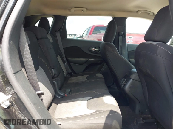 2016 Jeep Cherokee Sport with VIN 1C4PJLAB5GW297349, listed as a IAAI auction lot 42367544 with 142,930 mi miles and . Bid and sale history available at DreamBid. Image 8.