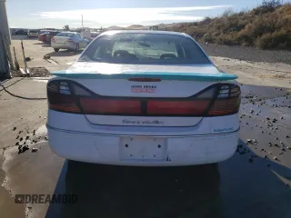 2000 Pontiac Bonneville SE z VIN 1G2HX54K2Y4241848, wystawiony jako Copart lot #80999434 z przebiegiem Nie podano mil oraz Szkoda całkowita • Salvage title. Historia ofert i sprzedaży dostępna na DreamBid. Obrazek 6.