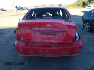 2005 Hyundai Accent GLS with VIN KMHCG35C65U348300, listed as a Copart auction lot 77847614 with 141,102 mi miles and Salvage Title. Bid and sale history available at carsss.com. Image 6.