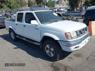 2000 Nissan Frontier XE z VIN 1N6ED27T5YC433357, wystawiony jako IAAI lot #42405160 z przebiegiem 290 620 mil mil oraz . Historia ofert i sprzedaży dostępna na DreamBid. Obrazek 1.