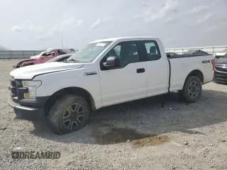 2015 Ford F-150 XLT with VIN 1FTFX1EF0FKE44033, listed as a Copart auction lot 48790705 with 104,141 mi miles and Salvage Title. Bid and sale history available at carsss.com. Image 1.