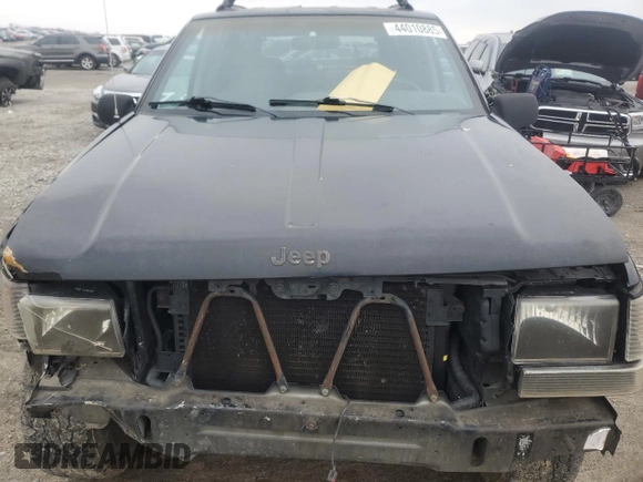 1998 Jeep Grand Cherokee Laredo with VIN 1J4GZ58S2WC281923, listed as a Copart auction lot 44010885 with 210,959 mi miles and Salvage Title. Bid and sale history available at carsss.com. Image 12.