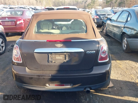 2011 MINI Convertible with VIN WMWZN3C55BT133367, listed as a IAAI auction lot 41781374 with 124,036 mi miles and . Bid and sale history available at DreamBid. Image 16.