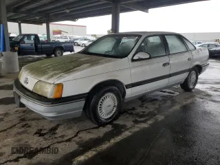 1987 Ford Taurus GL z VIN 1FABP52U3HA184329, wystawiony jako Copart lot #47898465 z przebiegiem 89 306 mil mil oraz Czysty tytuł • Clean title. Historia ofert i sprzedaży dostępna na DreamBid. Obrazek 1.