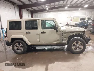2018 Jeep Wrangler JK Unlimited Sahara with VIN 1C4HJWEG4JL803516, listed as a IAAI auction lot 41127652 with 85,749 mi miles. Bid and sale history available at carsss.com. Image 14.