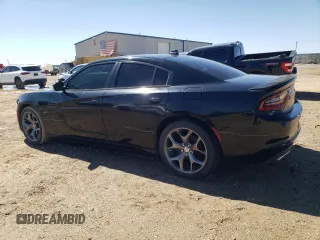 2015 Dodge Charger RT with VIN 2C3CDXCT0FH805909, listed as a Copart auction lot 42612035 with 77,493 mi miles and Salvage title. Bid and sale history available at DreamBid. Image 2.