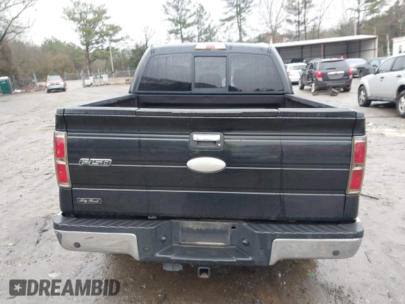 2011 Ford F-150 XLT with VIN 1FTFW1CT5BFB13799, listed as a IAAI auction lot 41426609 with 200,000 mi miles. Bid and sale history available at carsss.com. Image 15.