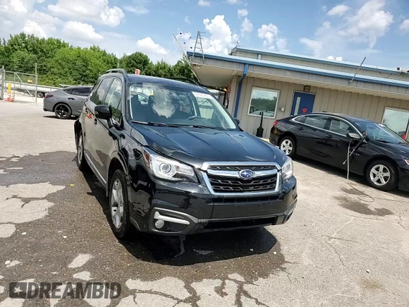 2017 Subaru Forester Touring z VIN JF2SJAWCXHH431232, wystawiony jako Copart lot #61625265 z przebiegiem 67 280 mil mil oraz Szkoda całkowita • Salvage title. Historia ofert i sprzedaży dostępna na DreamBid. Obrazek 13.