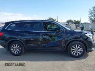2020 Honda Pilot EX-L with VIN 5FNYF5H54LB009448, listed as a IAAI auction lot 41697106 with 63,310 mi miles. Bid and sale history available at carsss.com. Image 13.