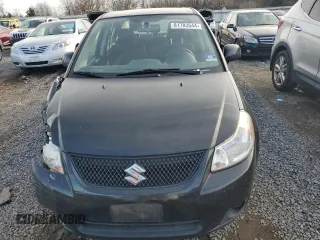 2012 Suzuki SX4 LE with VIN JS2YC5A32C6302316, listed as a Copart auction lot 81703544 with 87,411 mi miles and Salvage Title. Bid and sale history available at carsss.com. Image 5.