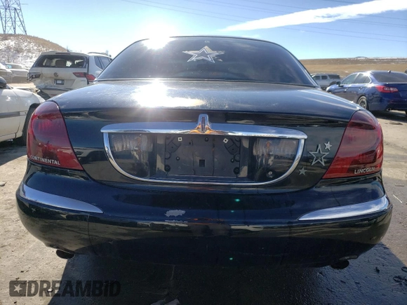 1998 Lincoln Continental with VIN 1LNFM97V7WY637848, listed as a Copart auction lot 43510885 with 141,796 mi miles and Salvage Title. Bid and sale history available at carsss.com. Image 6.