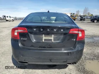 2014 Volvo S60 T5 z VIN YV1612FS0E2295344, wystawiony jako Copart lot #50101125 z przebiegiem 75 959 mil mil oraz Szkody całkowita. Historia ofert i sprzedaży dostępna na DreamBid. Obrazek 6.