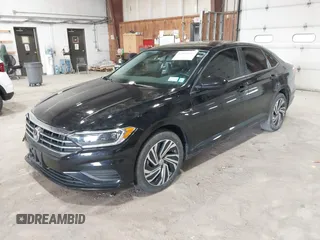 2021 Volkswagen Jetta SEL with VIN 3VWE57BU0MM093120, listed as a IAAI auction lot 42028835 with 39,986 mi miles and . Bid and sale history available at DreamBid. Image 2.