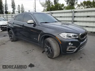 2017 BMW X6 sDrive35i with VIN 5UXKU0C36H0G69163, listed as a Copart auction lot 87044784 with 99,452 mi miles and Salvage Title. Bid and sale history available at carsss.com. Image 4.