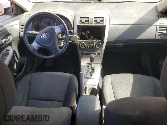 2010 Toyota Corolla z VIN 1NXBU4EE3AZ197969, wystawiony jako Copart lot #60699805 z przebiegiem 197 072 mil mil oraz Szkoda całkowita • Salvage title. Historia ofert i sprzedaży dostępna na DreamBid. Obrazek 8.