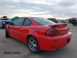 2004 Pontiac Grand Am z VIN 1G2NV12EX4M641018, wystawiony jako IAAI lot #41255352 z przebiegiem 144 385 mil mil oraz . Historia ofert i sprzedaży dostępna na DreamBid. Obrazek 3.