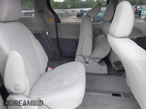 2014 Toyota Sienna L with VIN 5TDZK3DC5ES439593, listed as a IAAI auction lot 42420219 with 136,544 mi miles and . Bid and sale history available at DreamBid. Image 8.