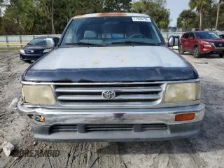 1997 Toyota T100 DX z VIN JT4TN12D3V0036552, wystawiony jako Copart lot #77829724 z przebiegiem 230 069 mil mil oraz Czysty tytuł • Clean title. Historia ofert i sprzedaży dostępna na DreamBid. Obrazek 5.