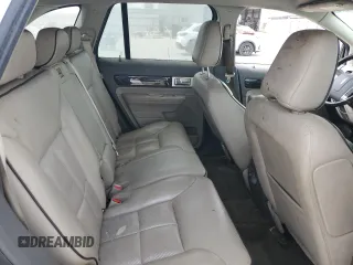2009 Lincoln MKX z VIN 2LMDU68C79BJ10255, wystawiony jako Copart lot #56764975 z przebiegiem 203 418 mil mil oraz Czysty tytuł • Clean title. Historia ofert i sprzedaży dostępna na DreamBid. Obrazek 11.