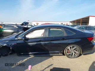 2019 Volkswagen Jetta GLI S z VIN 3VW5T7BU3KM245927, wystawiony jako IAAI lot #41573257 z przebiegiem 57 322 mil mil oraz . Historia ofert i sprzedaży dostępna na DreamBid. Obrazek 15.