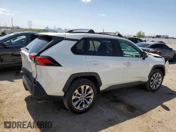 2021 Toyota RAV4 XLE Premium with VIN 2T3C1RFV0MW153089, listed as a Copart auction lot 60759615 with 28,153 mi miles and Salvage title. Bid and sale history available at DreamBid. Image 3.