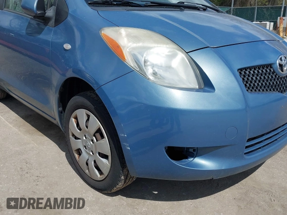 2008 Toyota Yaris with VIN JTDJT903385184035, listed as a IAAI auction lot 42048168 with 140,603 mi miles. Bid and sale history available at carsss.com. Image 6.