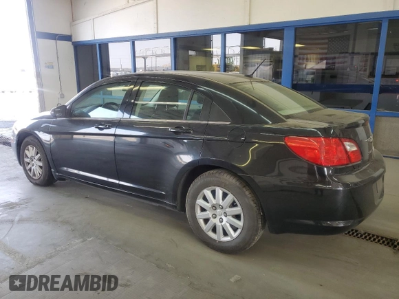 2010 Chrysler Sebring Touring with VIN 1C3CC4FBXAN220016, listed as a Copart auction lot 70784864 with 173,337 mi miles and Salvage Title. Bid and sale history available at carsss.com. Image 2.
