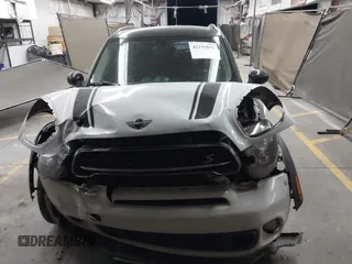 2015 MINI Countryman S with VIN WMWZC5C53FWT37722, listed as a IAAI auction lot 42151891 with 110,488 mi miles and . Bid and sale history available at DreamBid. Image 12.