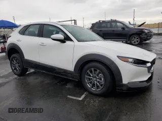 2023 Mazda CX-30 S with VIN 3MVDMBAM4PM522056, listed as a Copart auction lot 49122975 with 16,624 mi miles and Salvage title. Bid and sale history available at DreamBid. Image 4.