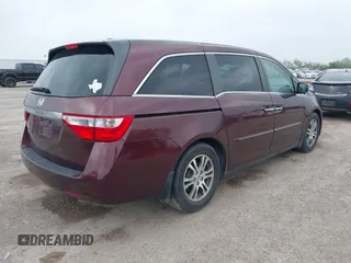 2012 Honda Odyssey EX-L with VIN 5FNRL5H61CB108301, listed as a IAAI auction lot 41939536 with 225,476 mi miles and . Bid and sale history available at DreamBid. Image 4.