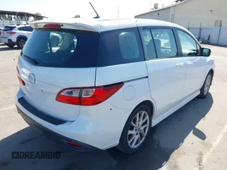 2012 Mazda 5 Touring with VIN JM1CW2CL7C0140452, listed as a IAAI auction lot 41970209 with 92,069 mi miles and . Bid and sale history available at DreamBid. Image 4.