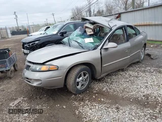 2002 Pontiac Bonneville SE z VIN 1G2HX54K624146331, wystawiony jako IAAI lot #41924115 z przebiegiem 83 665 mil mil oraz . Historia ofert i sprzedaży dostępna na DreamBid. Obrazek 17.